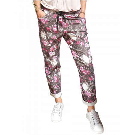 Pantalon fluide noir têtes de mort et fleurs blanches et roses